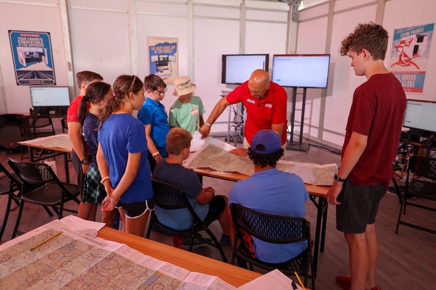 Redbird's K-12 Education Director, Greg Roark, teaching a class on navigation in the Redbird Sim Lab
