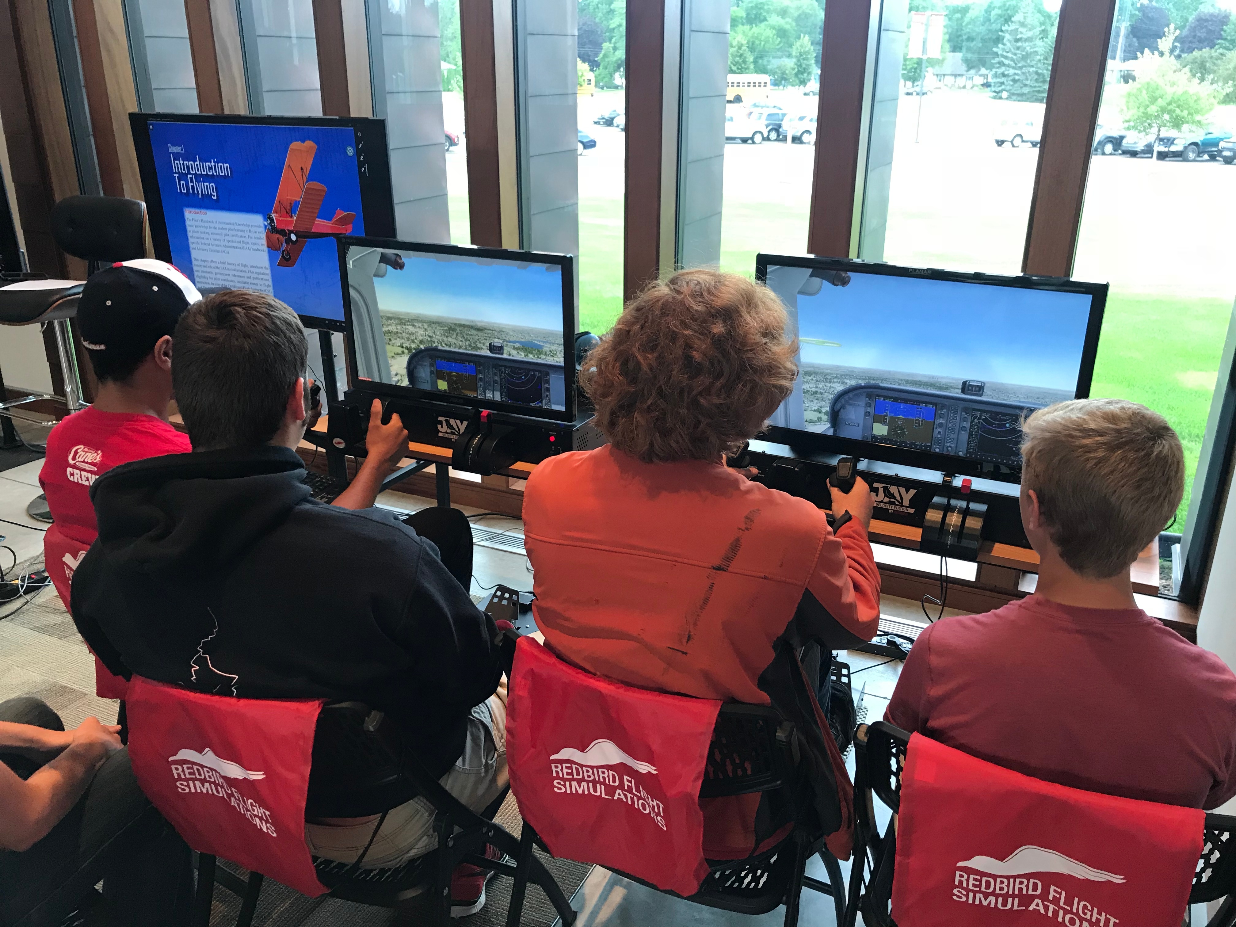 High school classroom flying scenarios on Redbird Jay flight simulators