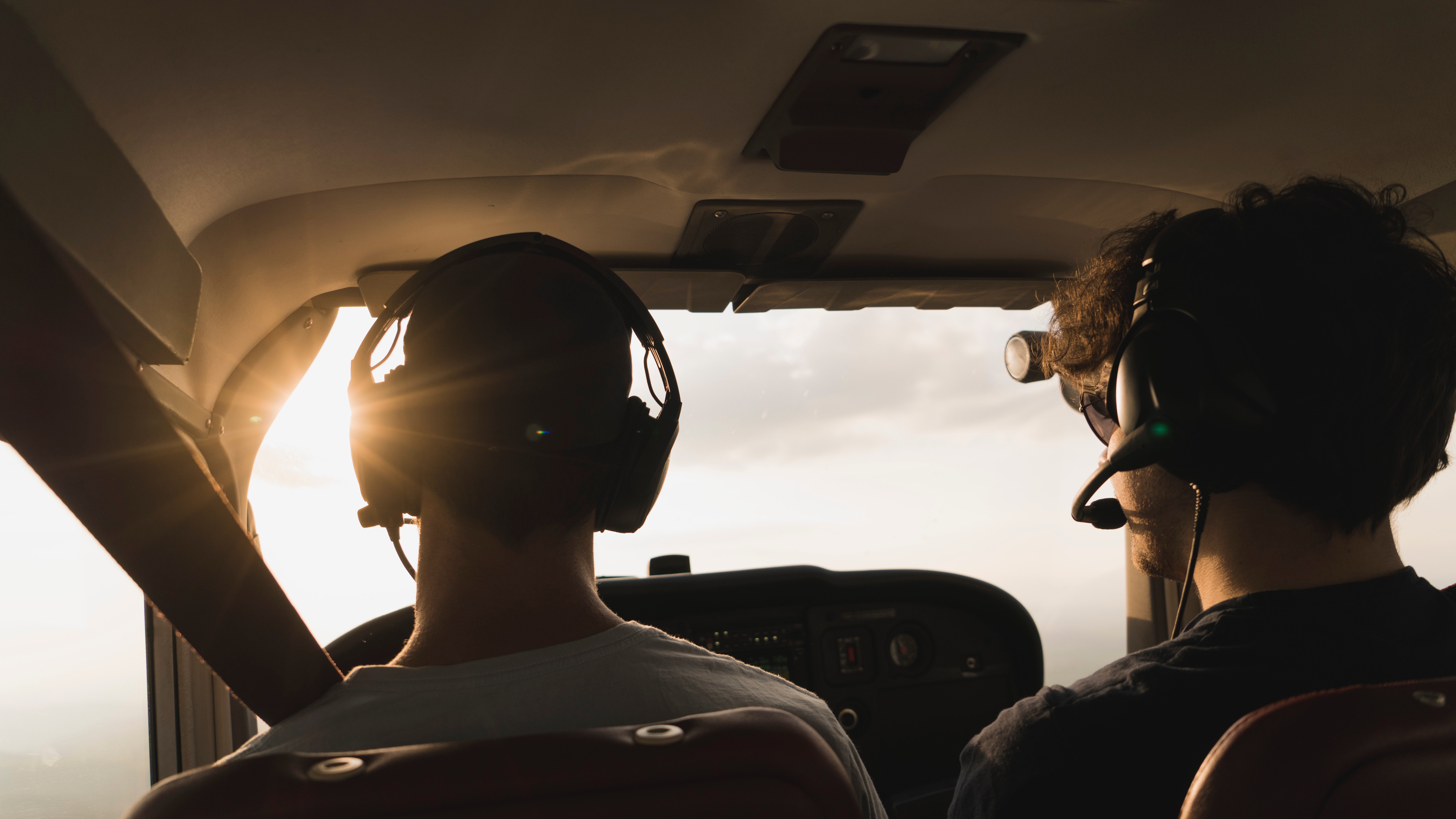 Pilot and flight instructor flying a training aircraft